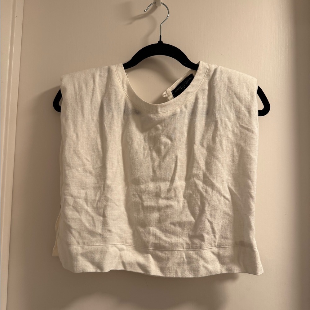 White crop top with shoulder pads